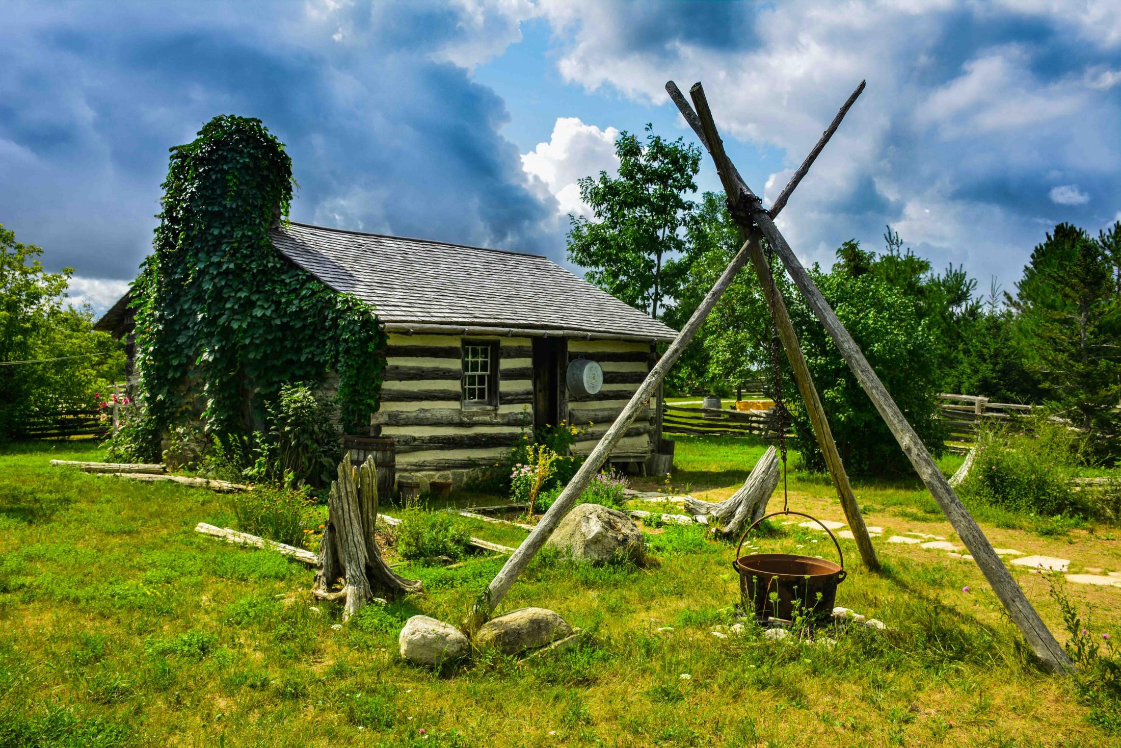 1853 Log Cabin on a Cloudy Summer Day