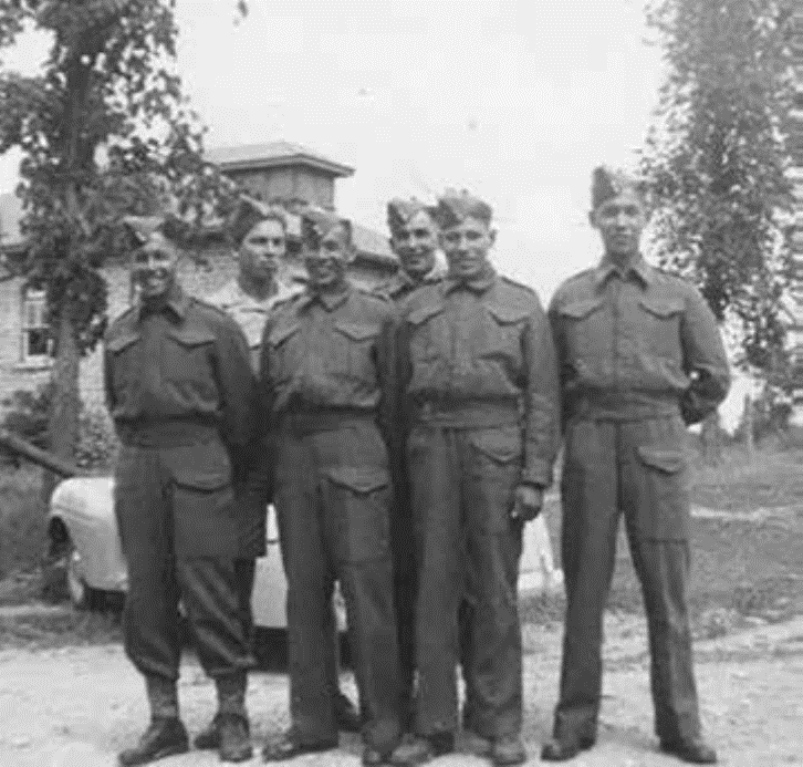 a group of six First Nations soldiers in uniform during the Second World War