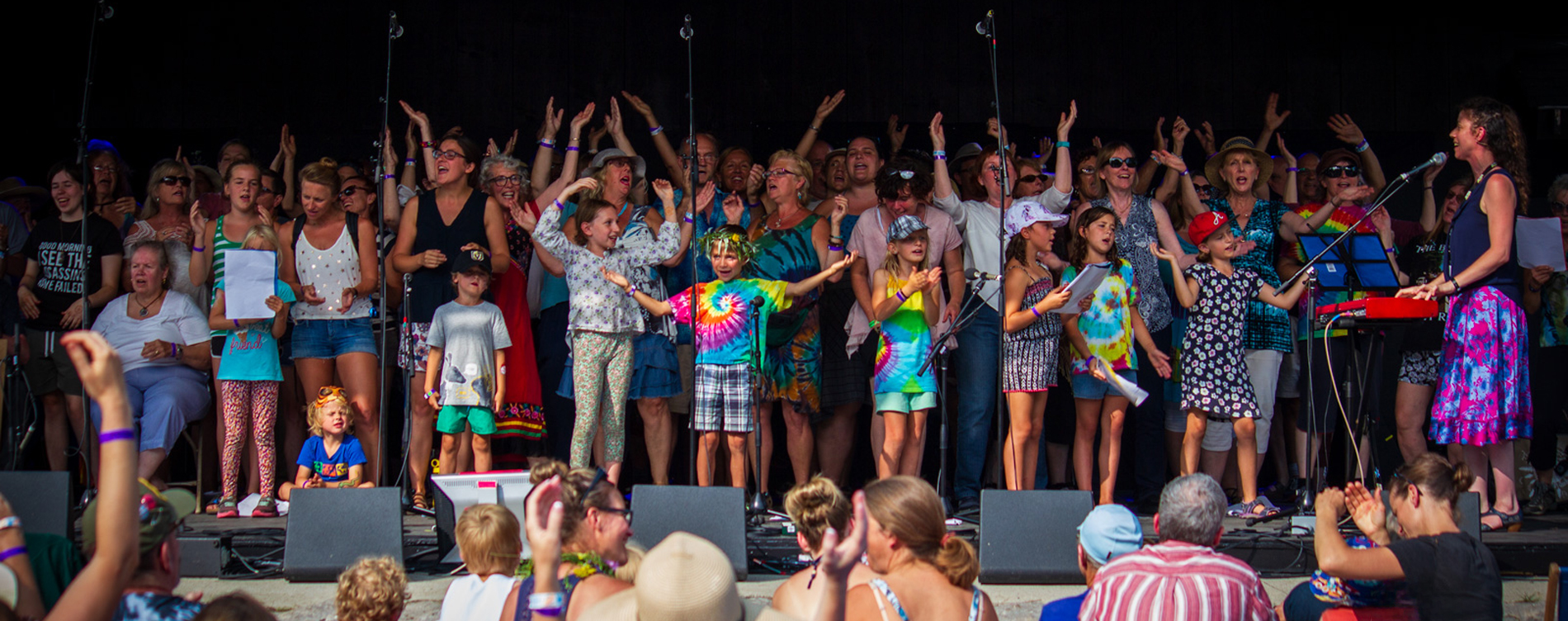 Many singers of various ages sing on the main stage at Summerfolk.