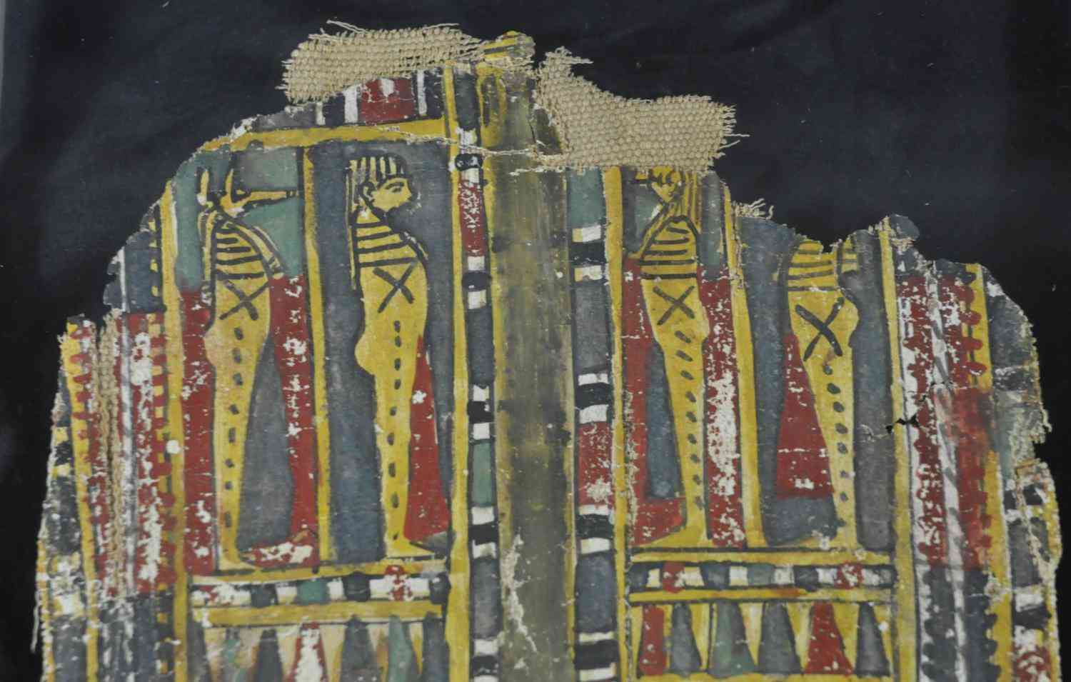 Four Sons of Horus Cartonnage – the baboon-headed figure at the right is missing its head area.  It is on loan “From the Daniel Kolos Gallery of Ancient Egyptian Art (Durham, Ont.)”