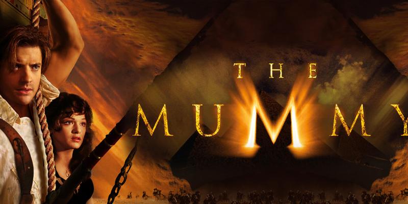 Movie poster for The Mummy showing a glowing title over a pyramid with desert and riders in the background.