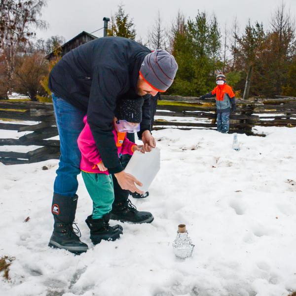 An outdoor program in Moreston Heritage Village. Science in the snow!