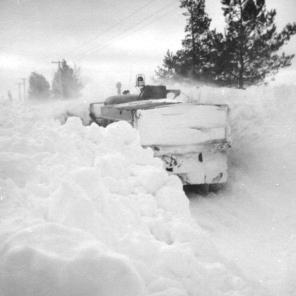 Snowplow operating in deep snow in Holland Township, April 1975.